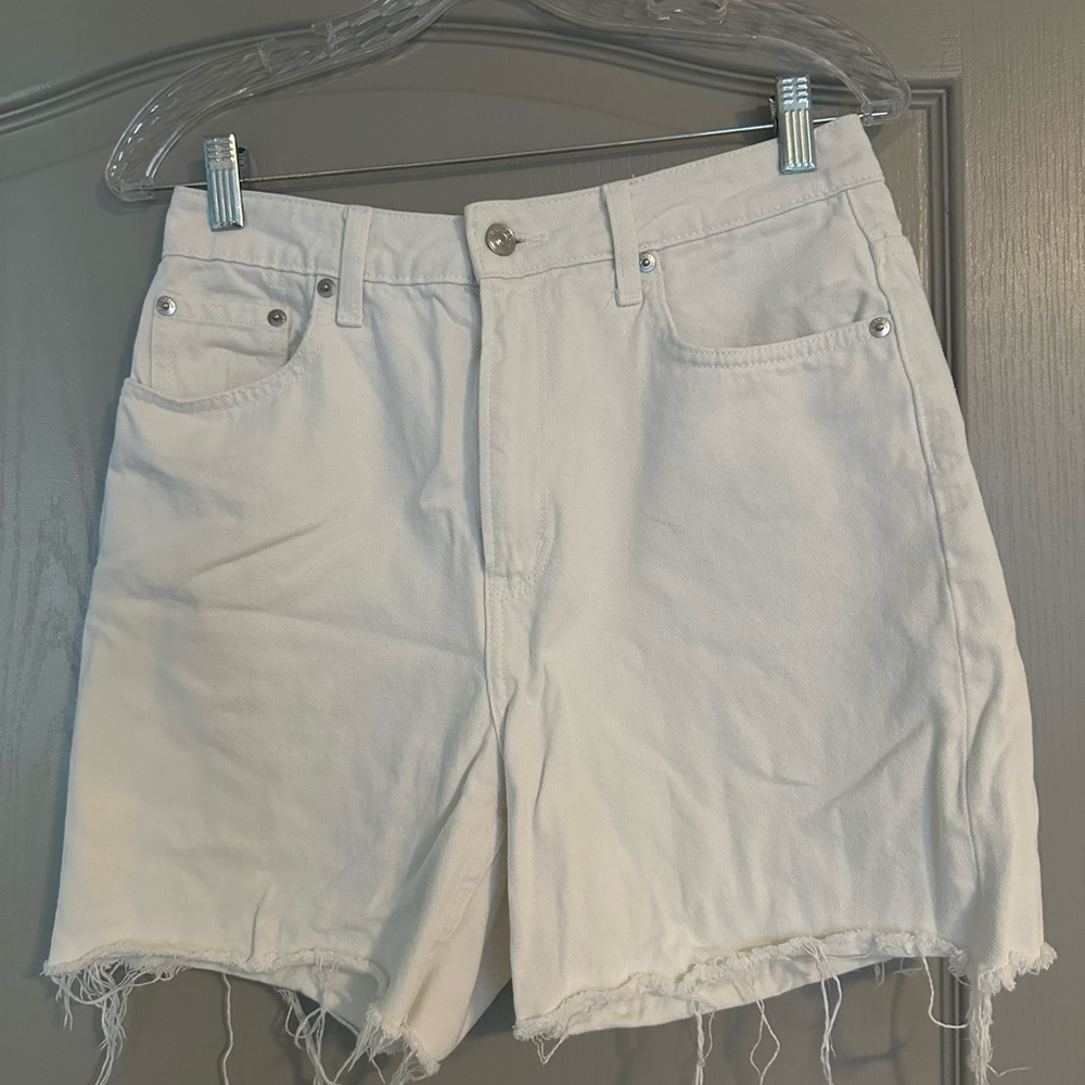 Mid length white denim shorts